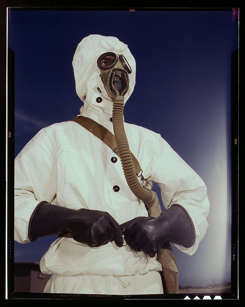 a sailor at the base wears the new type of protective clothing and gas mask designed for use in chemical warfare in corpus christi texas